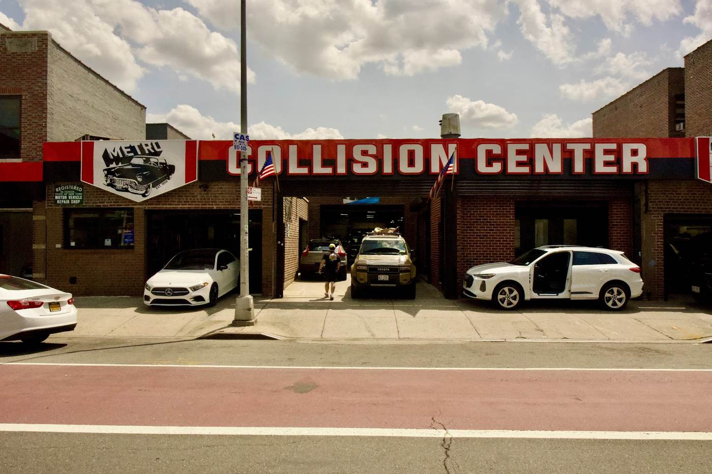 Metro Auto Body estimators reviewing a vehicle repair in Corona NY
